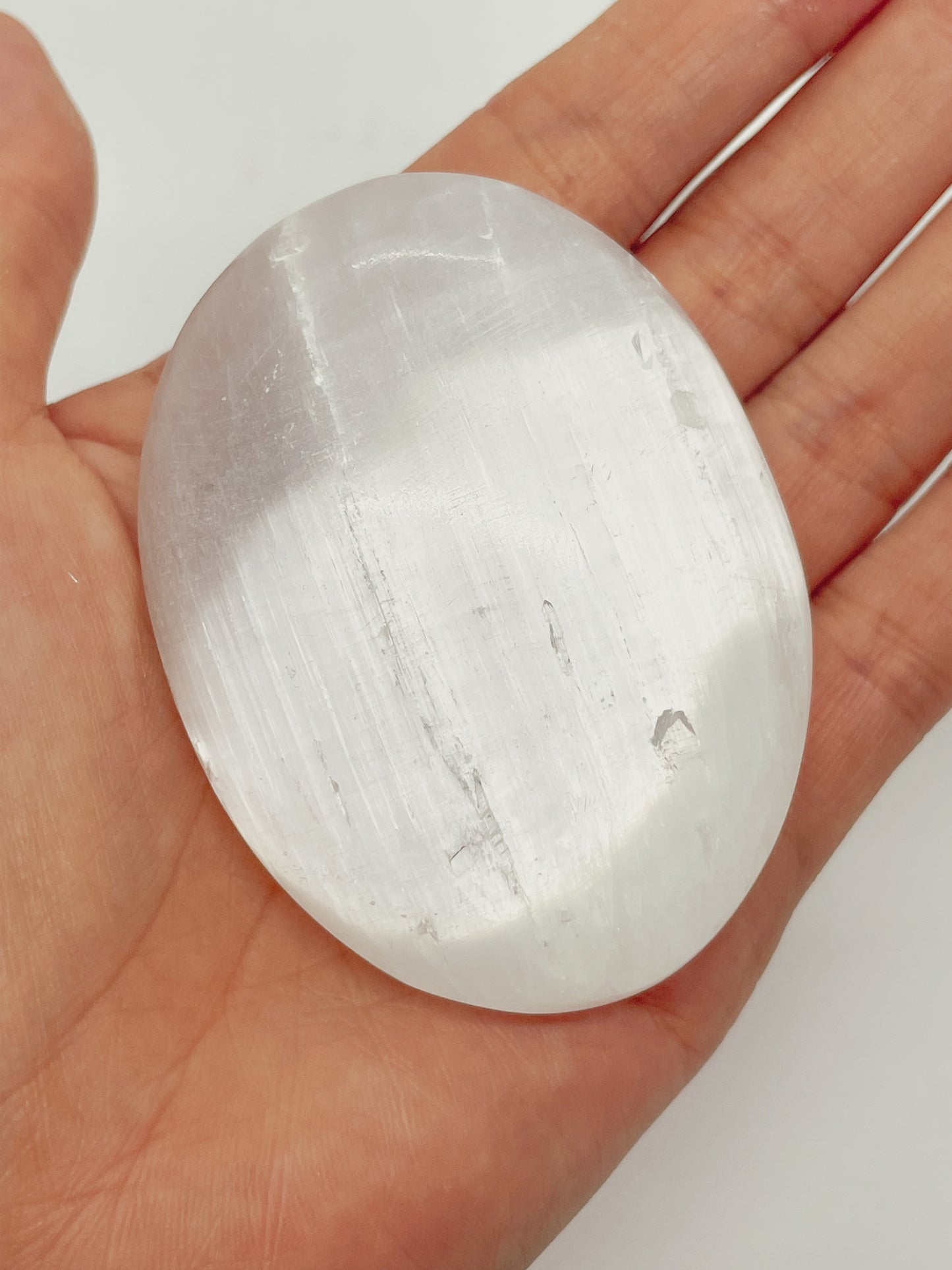 Selenite Palm stone